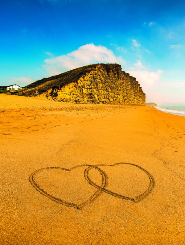 Two hearts on east beach (portrait)